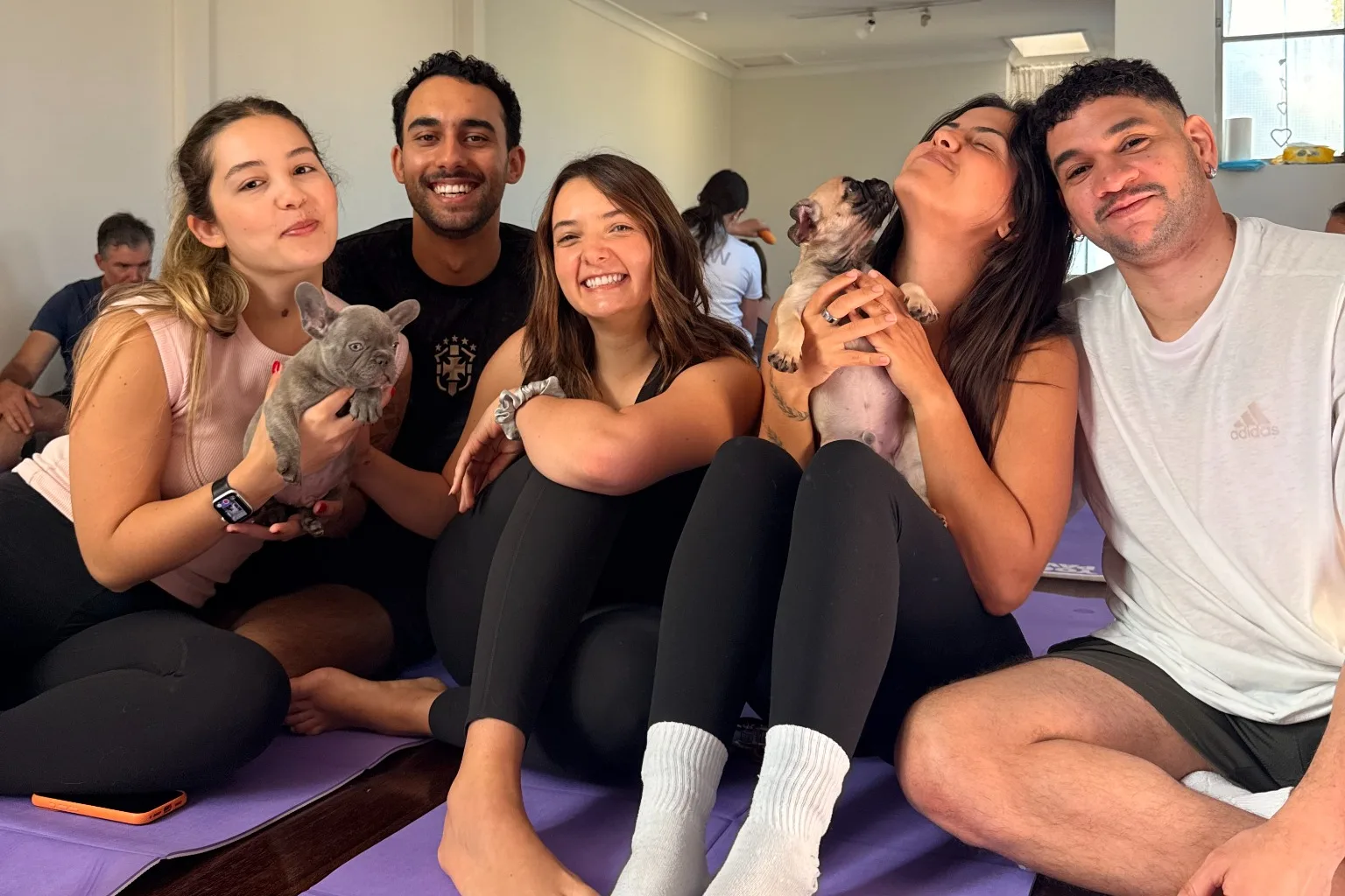 Photo for Puppy Yoga with Yoga Paws